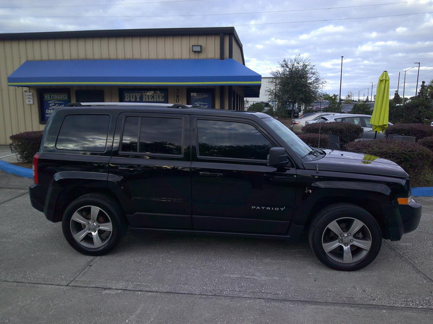 2016 BLACK JEEP PATRIOT LATITUDE (1C4NJPFA0GD) , located at 10405 Abercorn Street, Savannah, GA, 31419, (912) 921-8965, 31.988262, -81.131760 - Photo#2